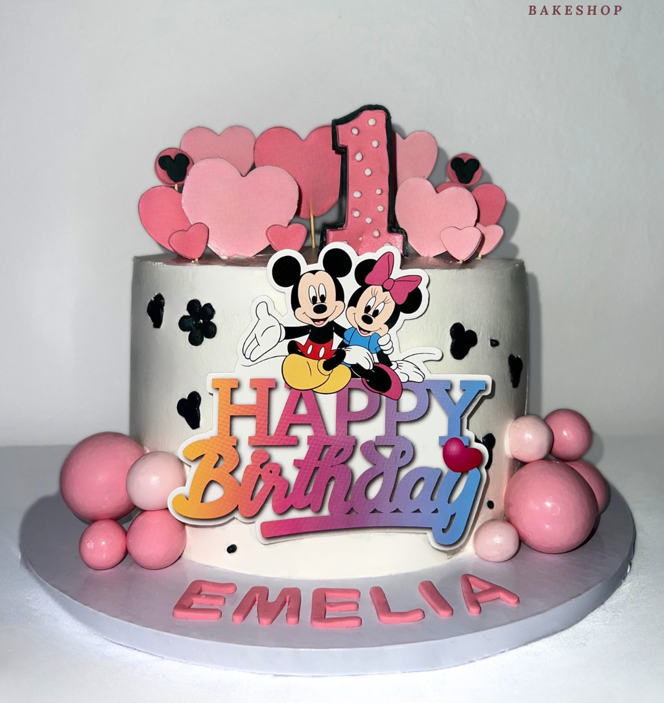 Colourful first birthday celebration cake