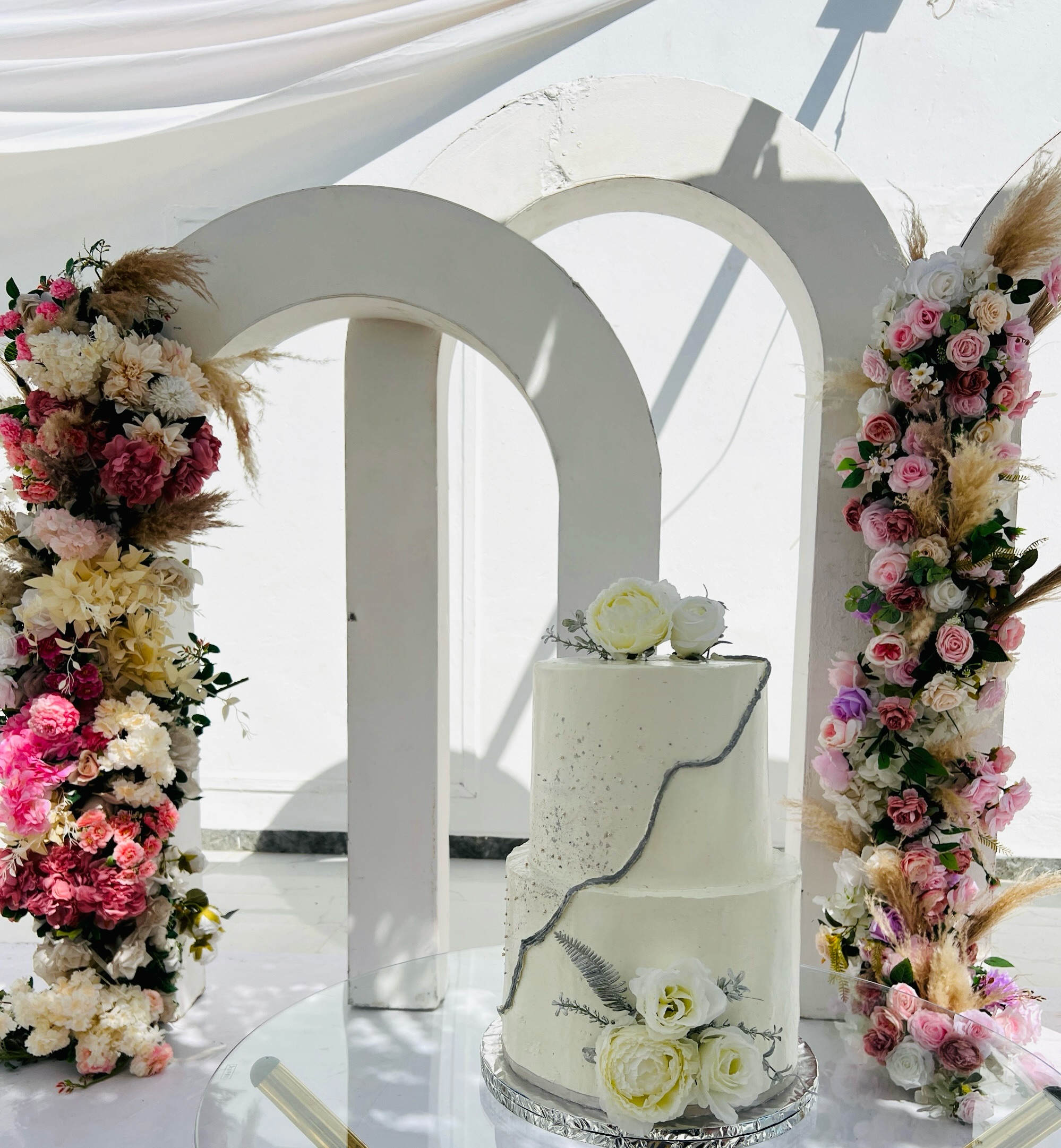 Elegant two-tier wedding cake by Ryn's Cakes