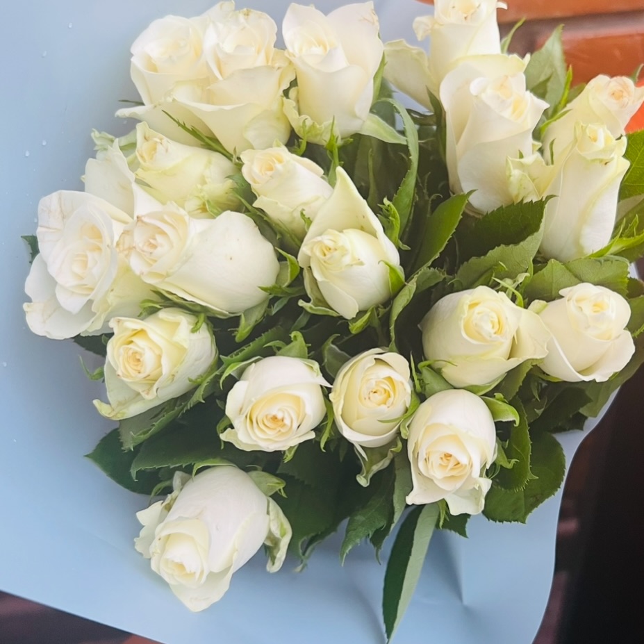 Hand-tied bouquet of white roses